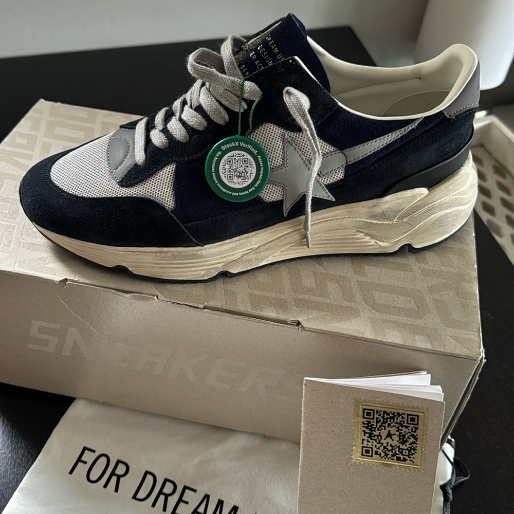 Purchased online, size too big. New with tags, bag, and box.